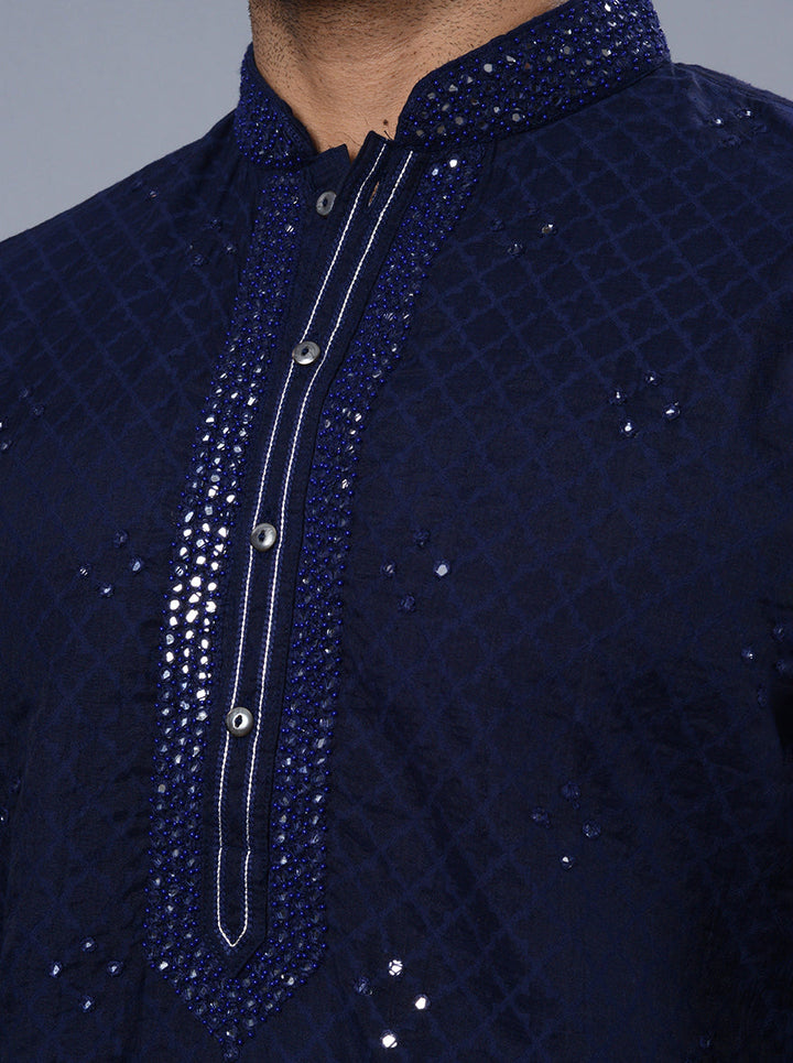 Versatile navy blue kurta pajama, suitable for formal wear.