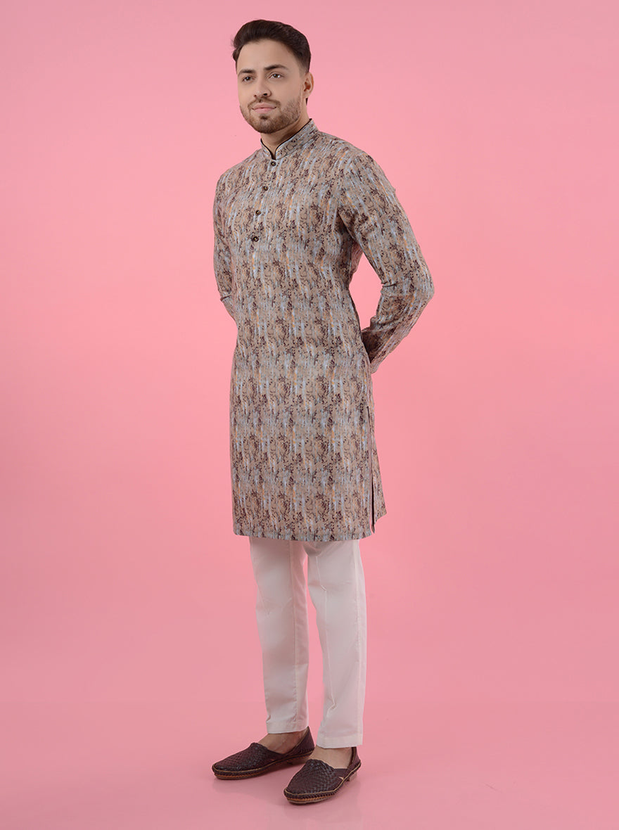 Men's brown kurta pajama set, made from linen fabric with a traditional print for ethnic wear.