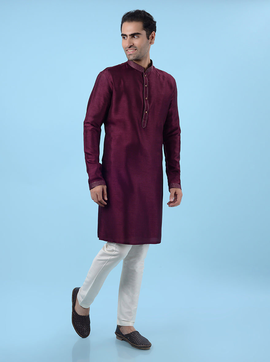 Men's festive wine kurta pajama set, made from silk blend for a luxurious and traditional ethnic look.