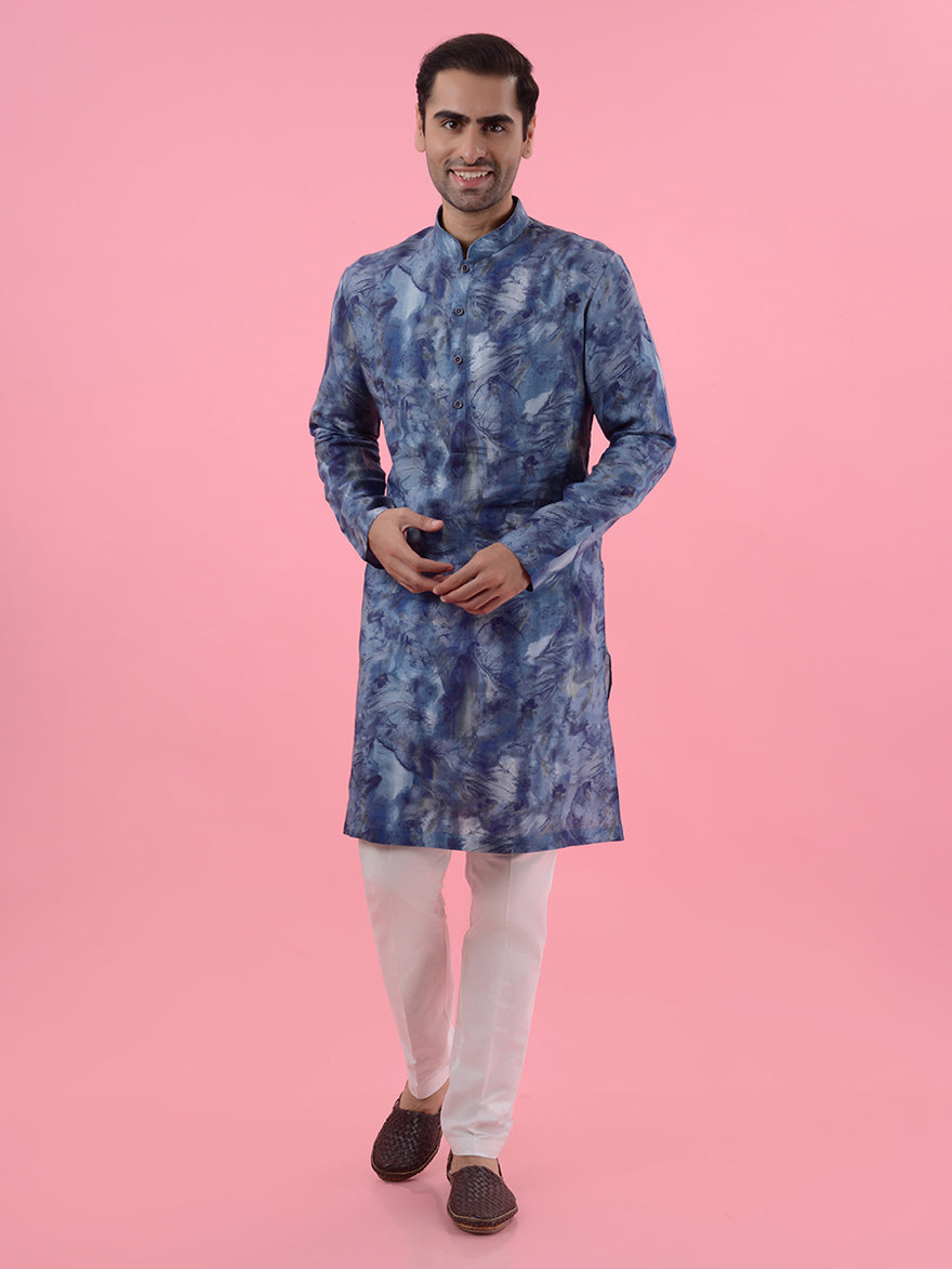 Discover the blend of comfort and elegance with this stylish blue printed kurta pajama for modern men.