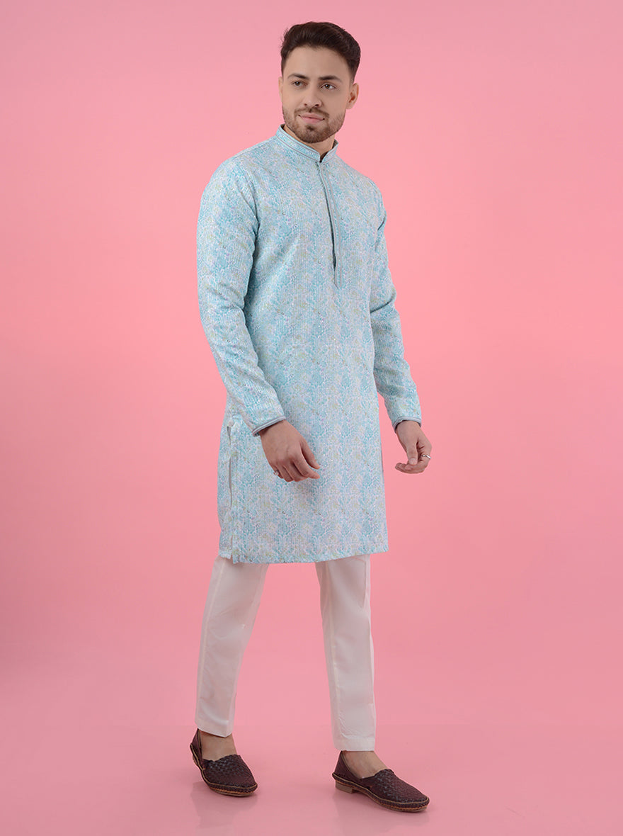 Embrace comfort and style with this aqua blue and white kurta pajama, ideal for enhancing your ethnic collection.