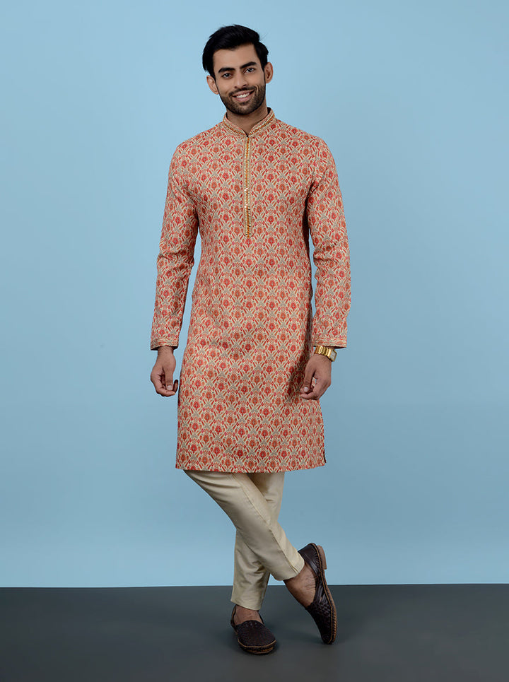 Elevate your ethnic wardrobe with this versatile Beige & Red Kurta Pajama.