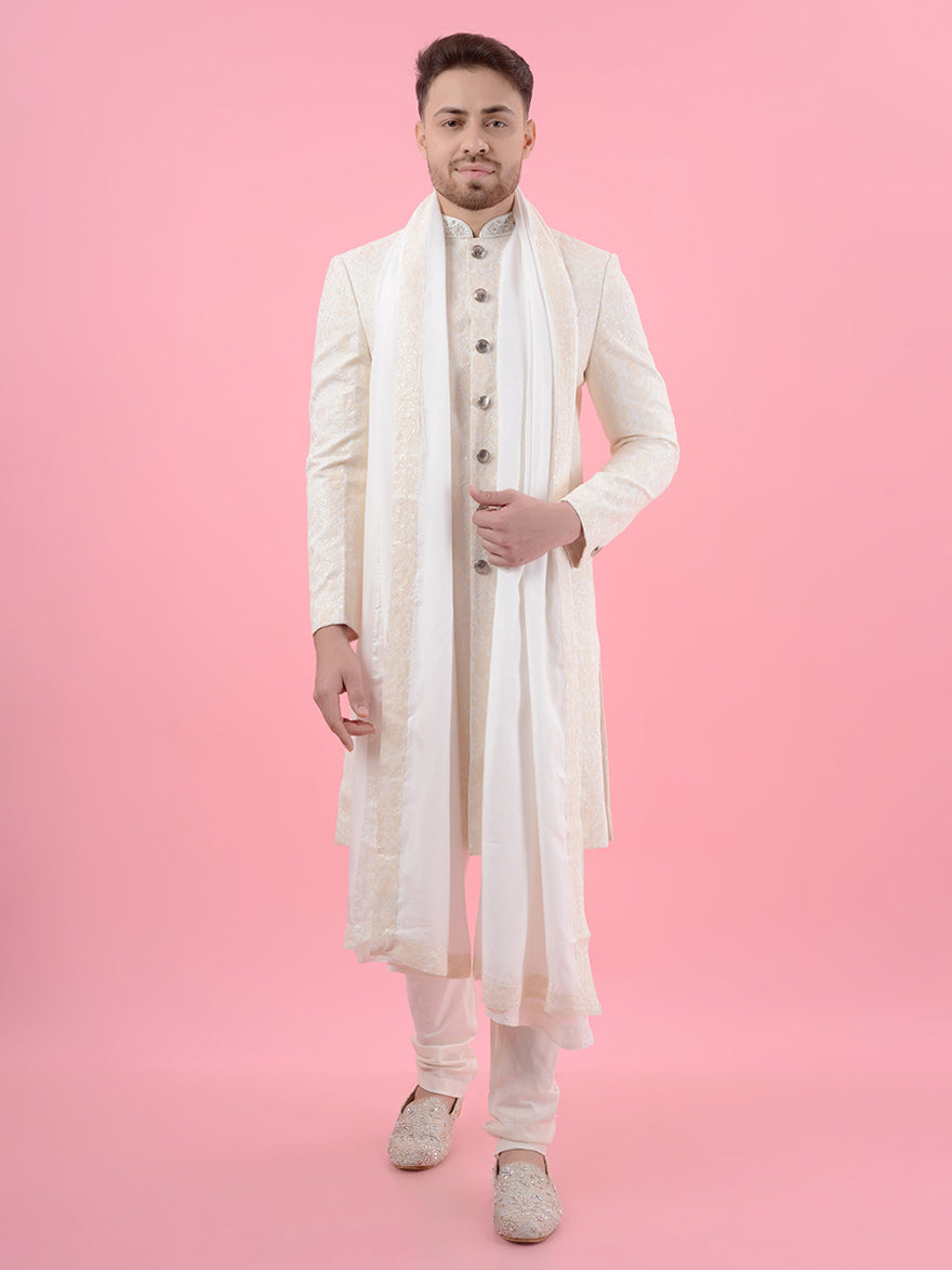 Elevate your wedding look with this Off-White Sherwani Set, featuring intricate floral embroidery and zardosi accents, ideal for grooms in the USA celebrating their special day with elegance and style.