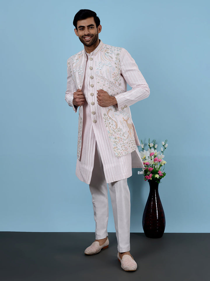 Shine in this Pink Indowestern, crafted from premium Silk Blend fabric and adorned with intricate Resham and bead work, ideal for upscale occasions in the USA.