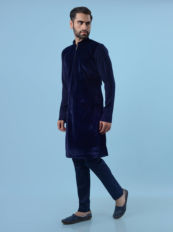 Elegant blue velvet kurta pajama set for men, designed for a sophisticated ethnic look.