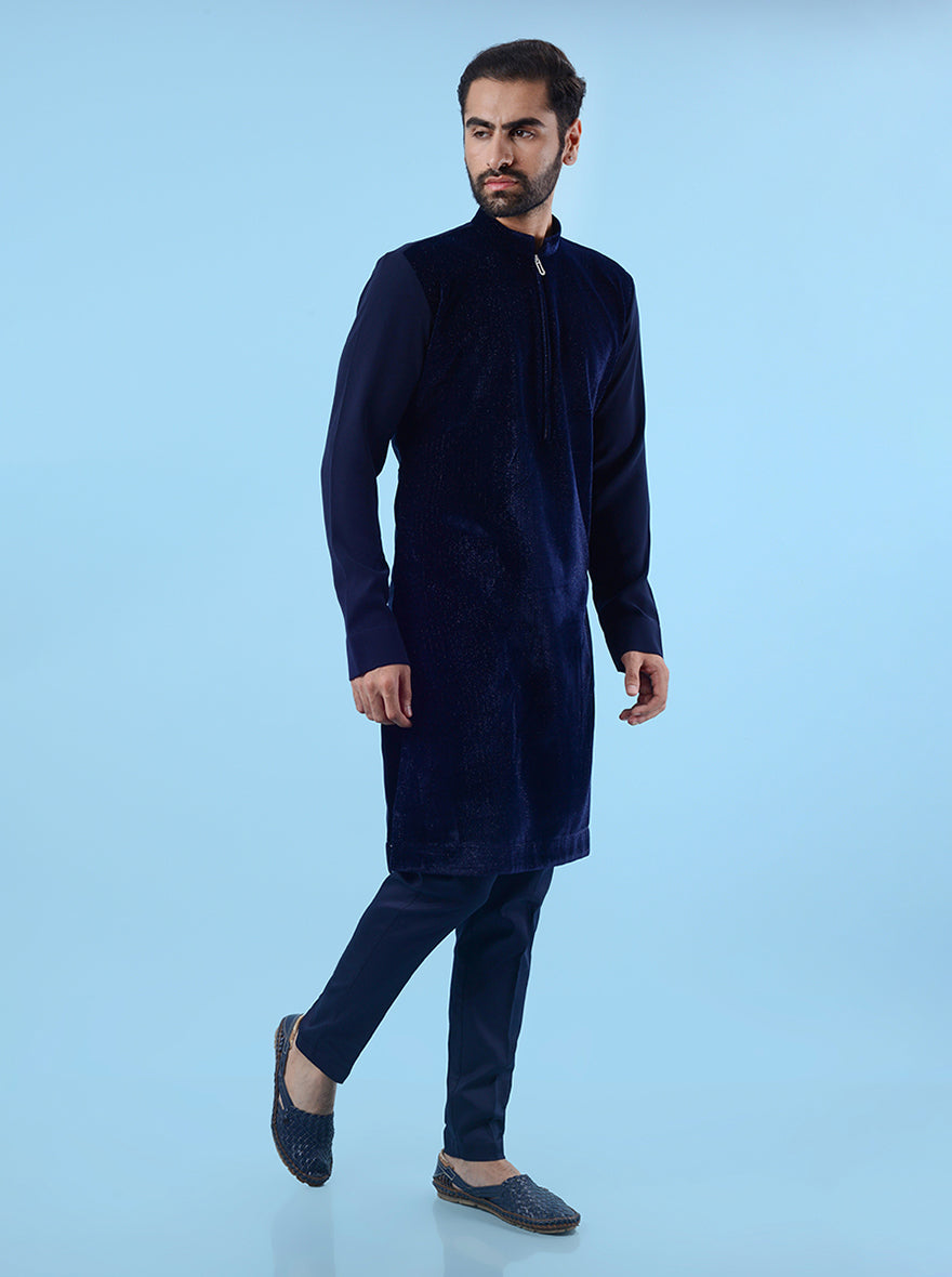 Blue velvet kurta pajama for men, designed for cultural and traditional events with a touch of luxury.