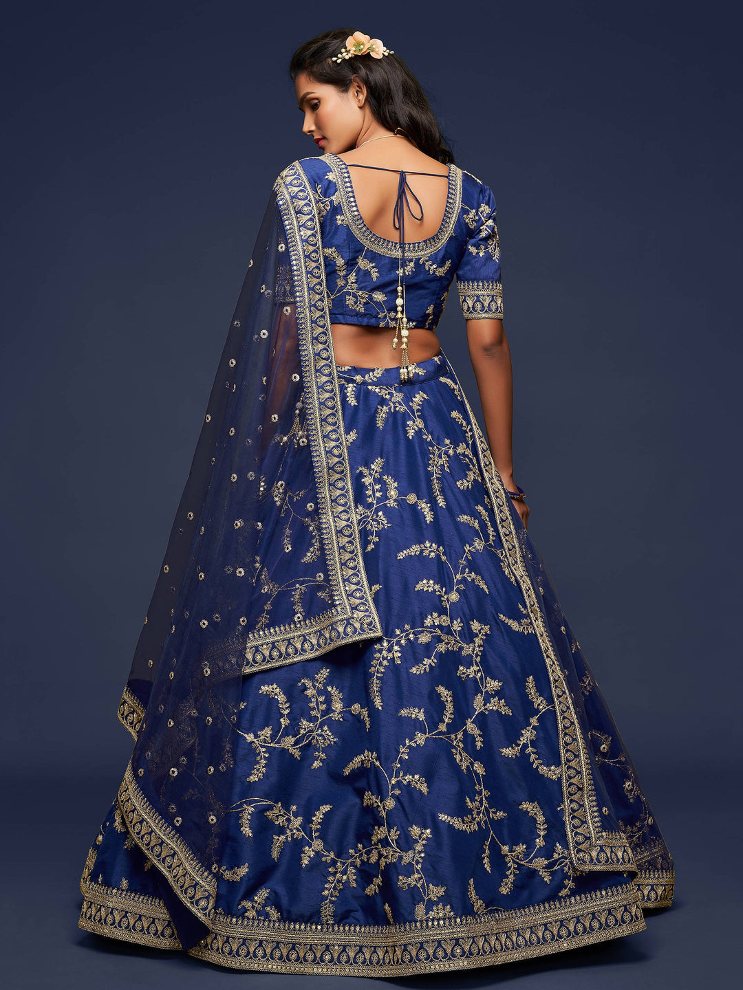 Traditional blue lehenga with lace dupatta for festivals and occasions.