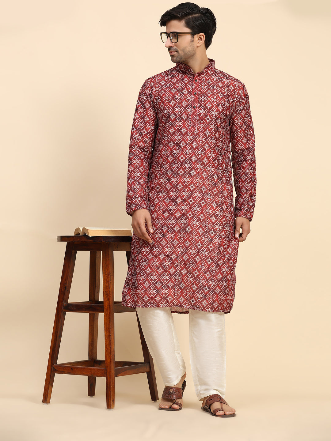 Stylish red kurta pajama for men with geometric digital print for festive occasions.