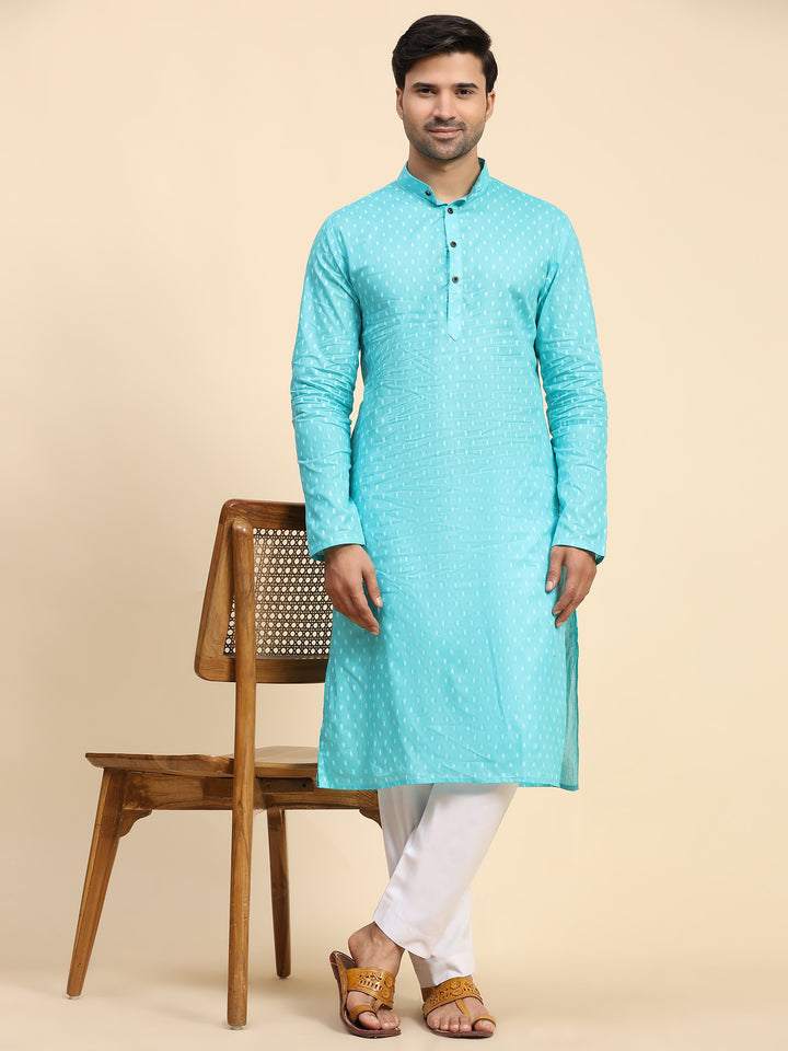 Elegant cyan blue kurta set for men with embroidered designs, ideal for festive occasions.