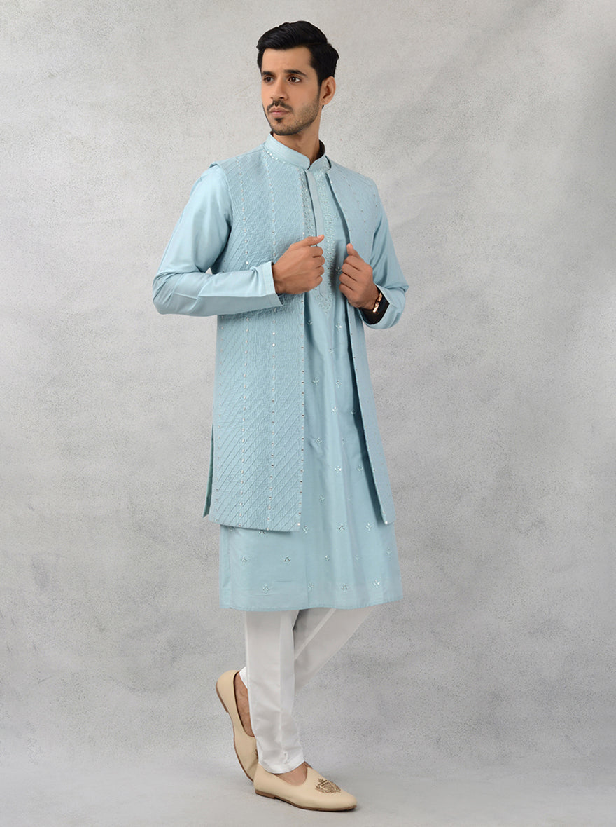 Exquisite sea blue silk kurta set featuring intricate mirror work for elegance.