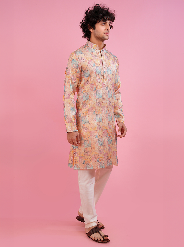 Stylish printed cream kurta pajama set for men, perfect for traditional and festive occasions.