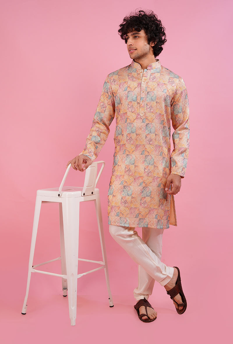 Men’s printed cream kurta pajama set, ideal for weddings, parties, and festive gatherings.