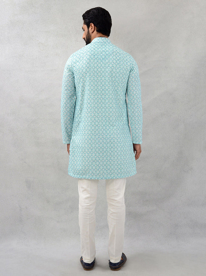 Stand out with this mint green kurta pajama, perfect for weddings in the USA.