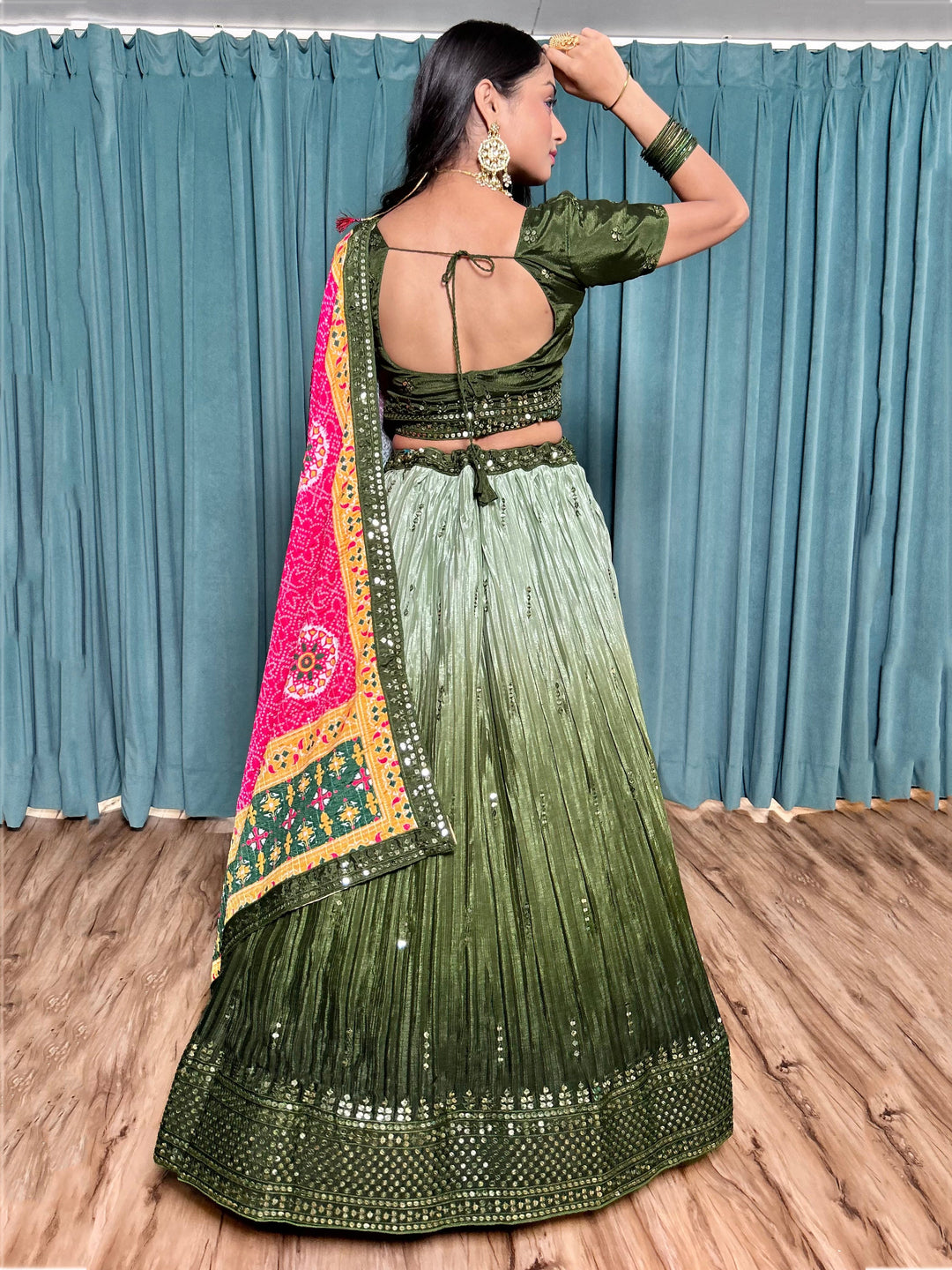 Fascinating Green Sequins Chinon Sangeet Wear Lehenga Choli