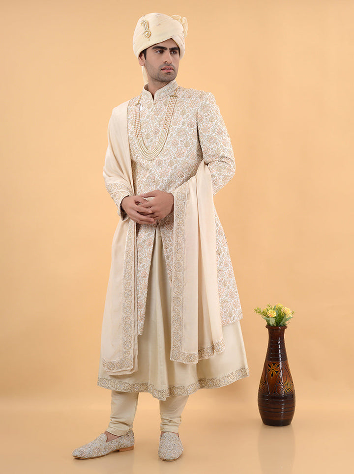 This Men's Cream Multi Sherwani combines classic elegance with contemporary flair, making it an ideal choice for grooms in the USA on their special day.