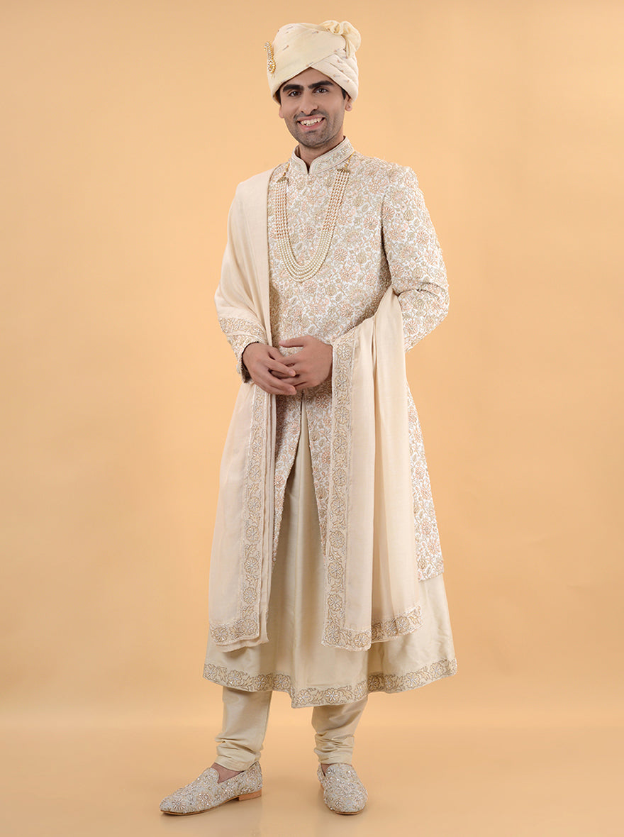 Make a statement with this Men's Cream Multi Sherwani, designed to offer a luxurious look for grooms in the USA celebrating weddings and special occasions.