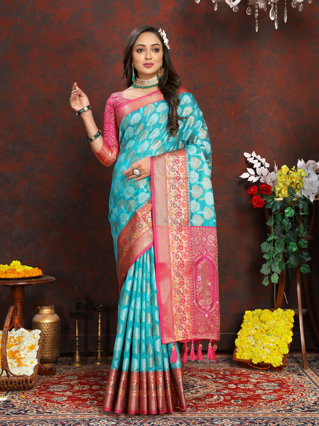 Elegant turquoise Meenakari Organza silk saree with intricate weaving, perfect for cultural celebrations.