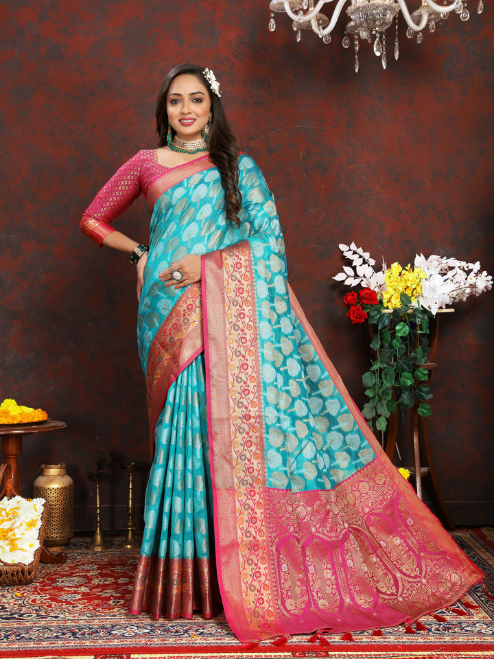 Designer turquoise Organza silk saree with stunning Meenakari weaving, perfect for weddings and ceremonies.