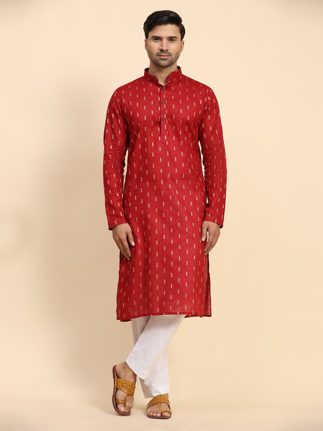 Red pure cotton kurta for men with handwoven motifs on neckline and cuffs.