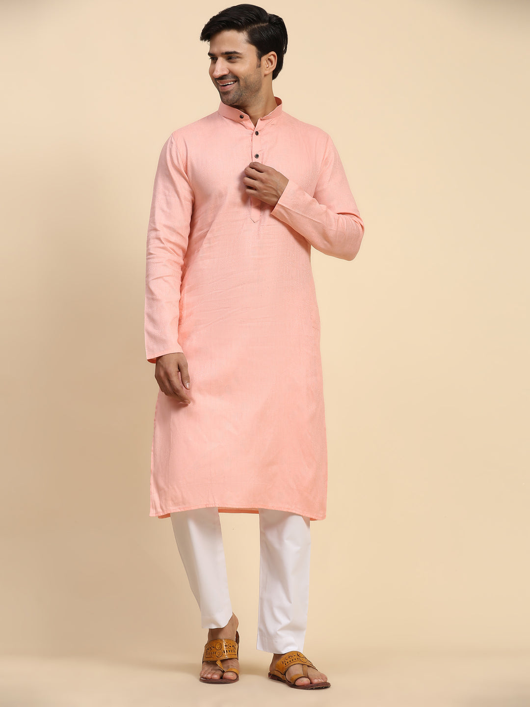 Baby pink kurta pajama set for men, featuring intricate embroidery and premium cotton.