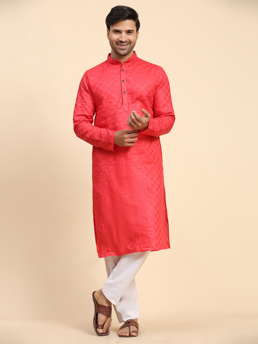 Red kurta pajama set for men with intricate embroidery and premium cotton fabric.