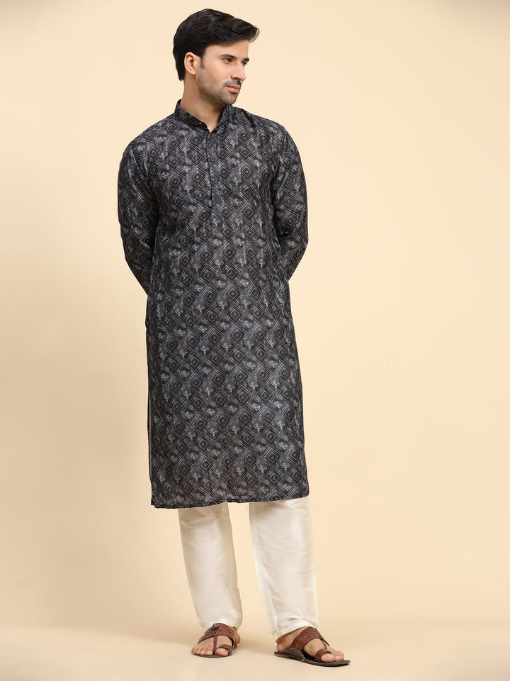 Elegant black kurta set for men, designed for festive wear and sangeet.