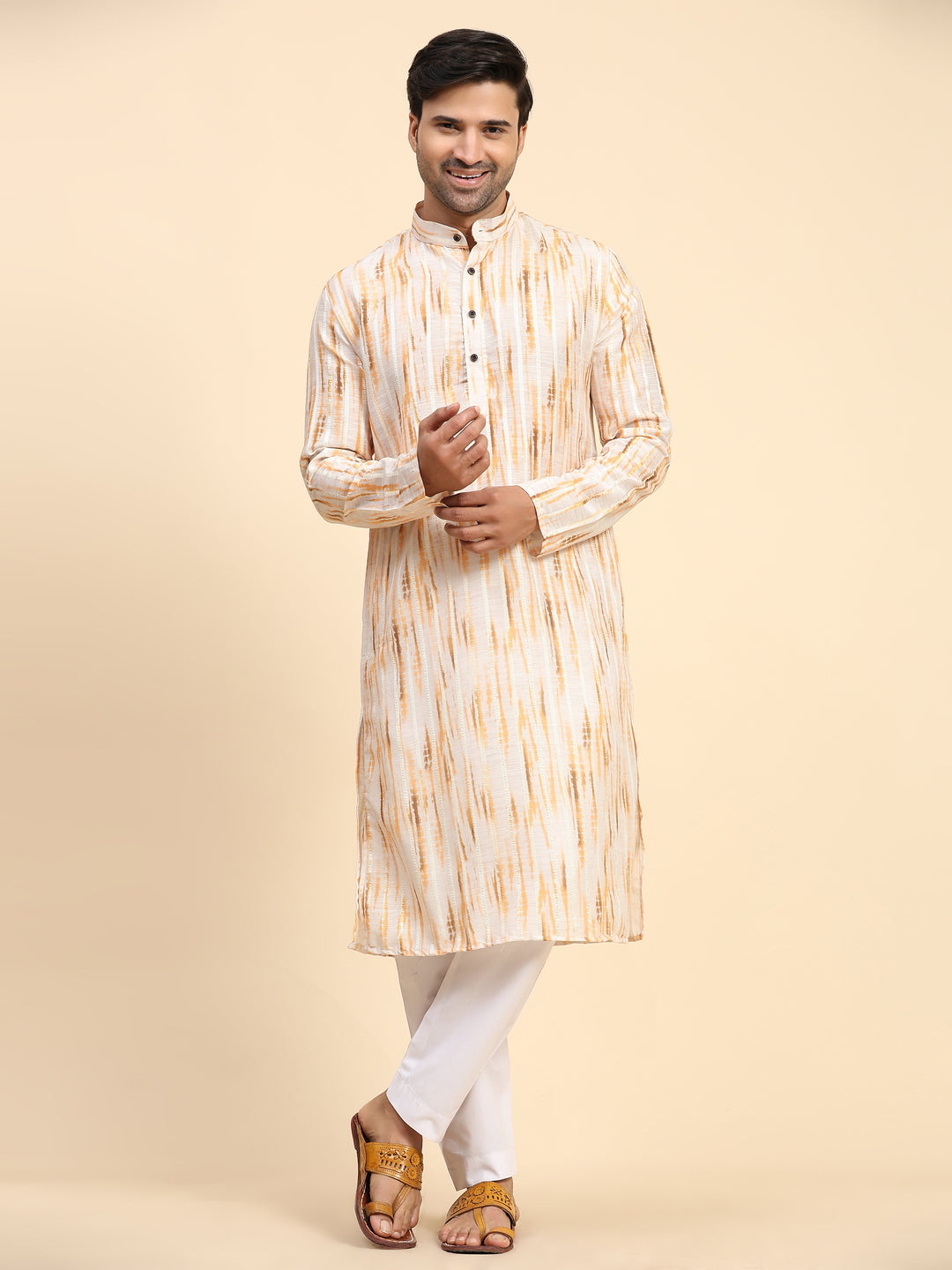 Yellow kurta pajama set for men with vibrant tie-dye print, perfect for Haldi.