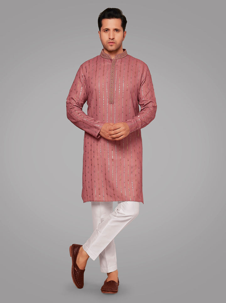 Elegant red kurta set featuring full sleeves, crafted for traditional celebrations at mehndi ceremonies in the USA.