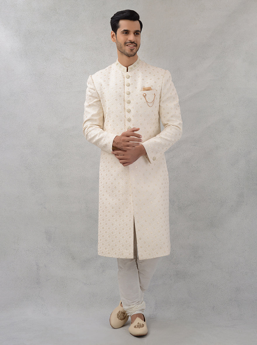 Elevate your wedding style with this cream embroidered sherwani, designed for comfort and elegance, ensuring you stand out on your special day.