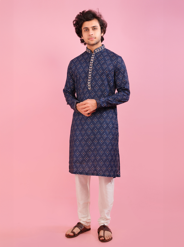 Elegant blue silk kurta for men, adorned with intricate embroidery.