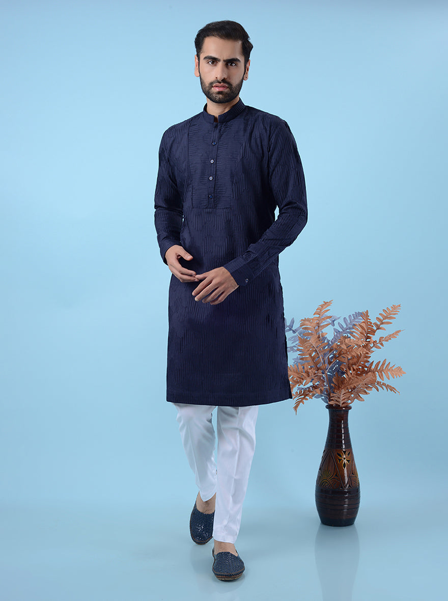 Luxurious blue kurta pajama featuring elegant designs, perfect for festive events happening in the USA.