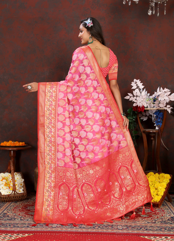 Beautiful coral pink Meenakari Organza silk saree with intricate weaving, perfect for special occasions.