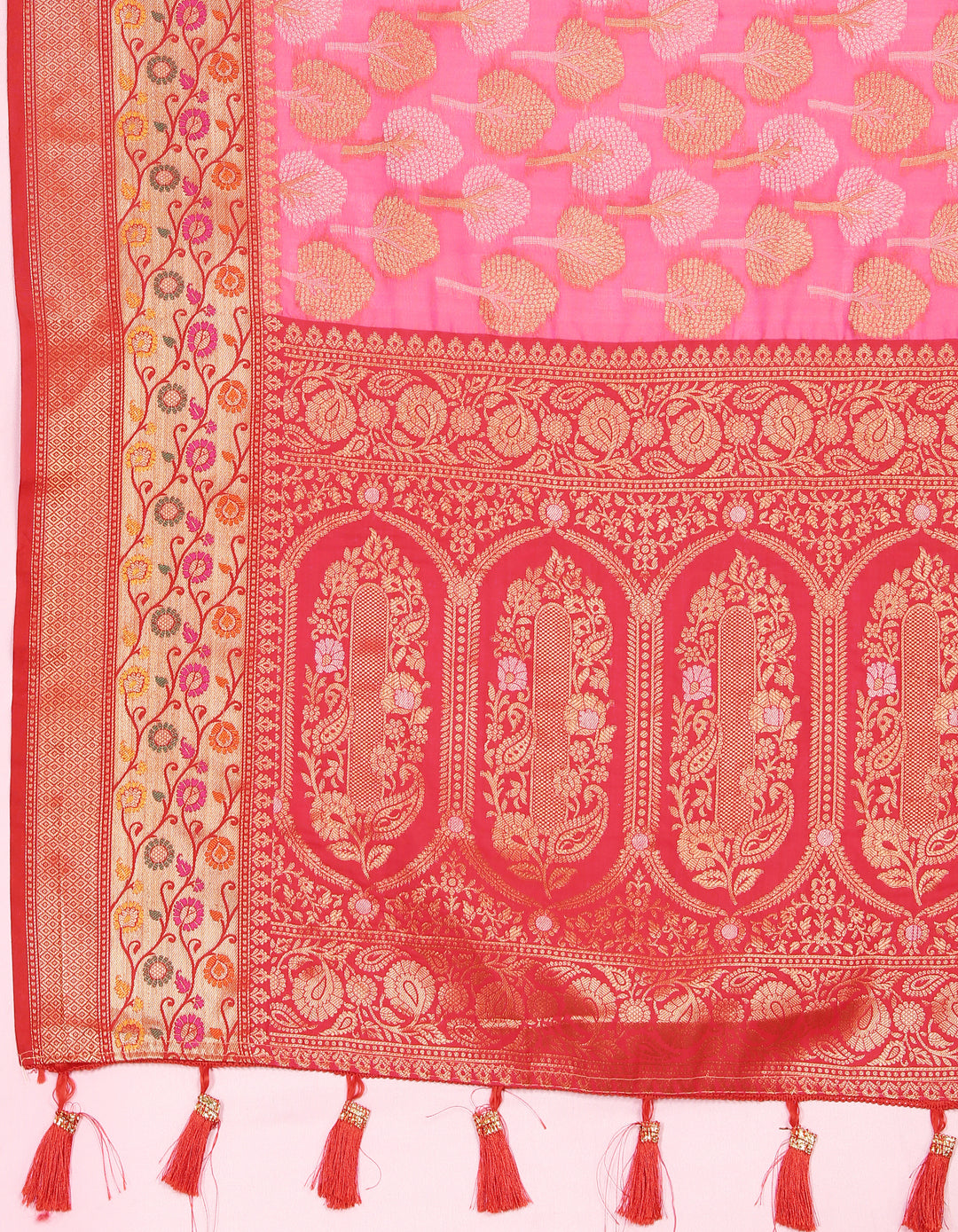 Luxurious coral pink Organza silk saree with Meenakari design, ideal for formal gatherings.