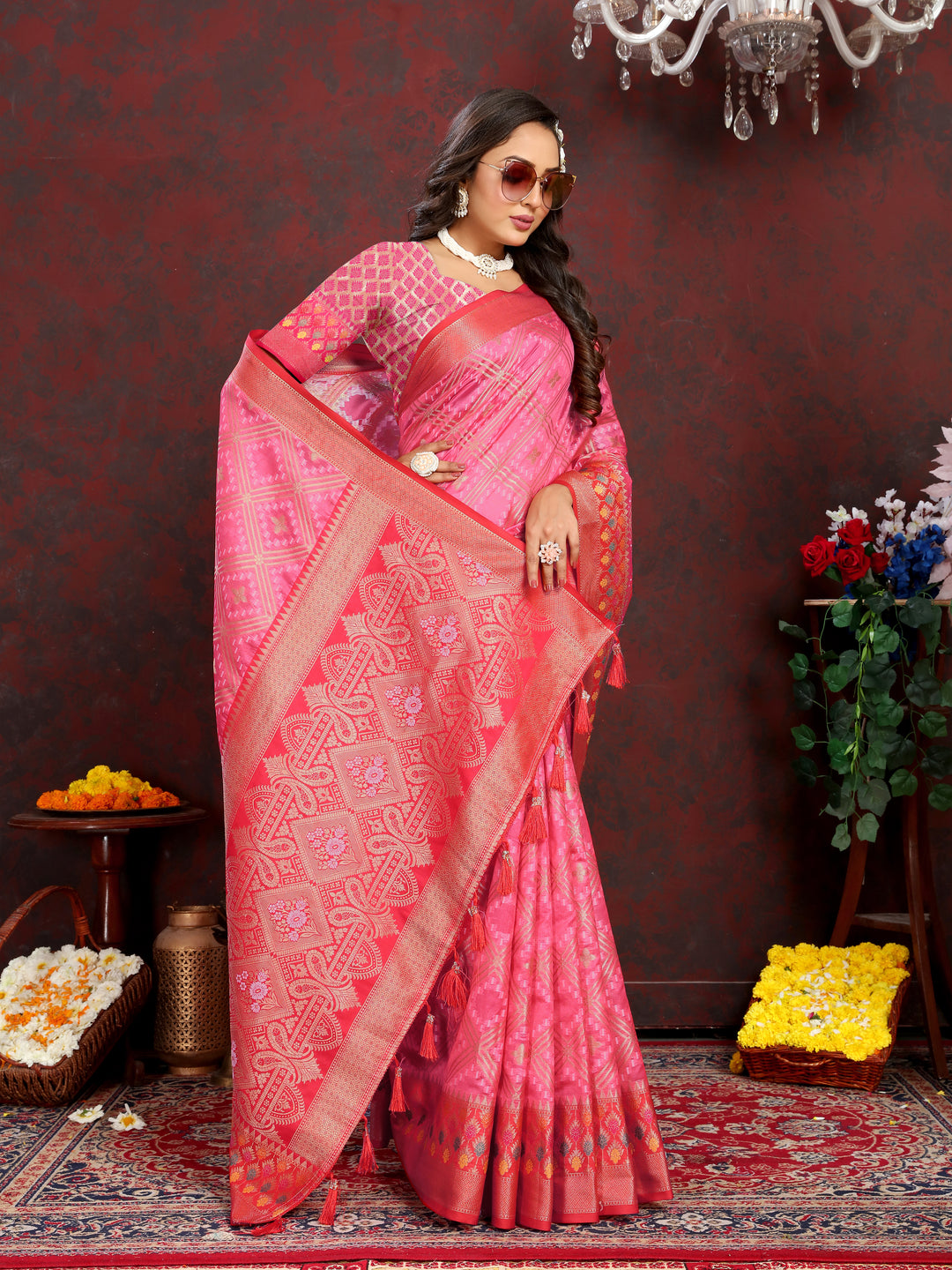 Designer coral pink Organza silk saree with rich Meenakari pallu, perfect for weddings.