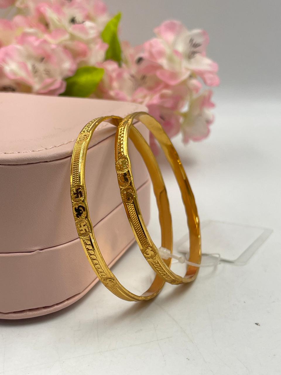 Bold golden bangles that stand out and make a statement.