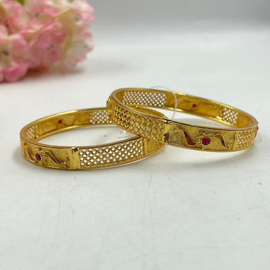 Sophisticated golden bangles that enhance evening wear.