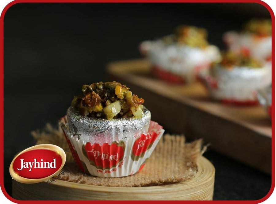 Gulkand Katori, rose petal jam in a crispy flour cup, offering a perfect balance of floral sweetness and crunchy texture in each bite.