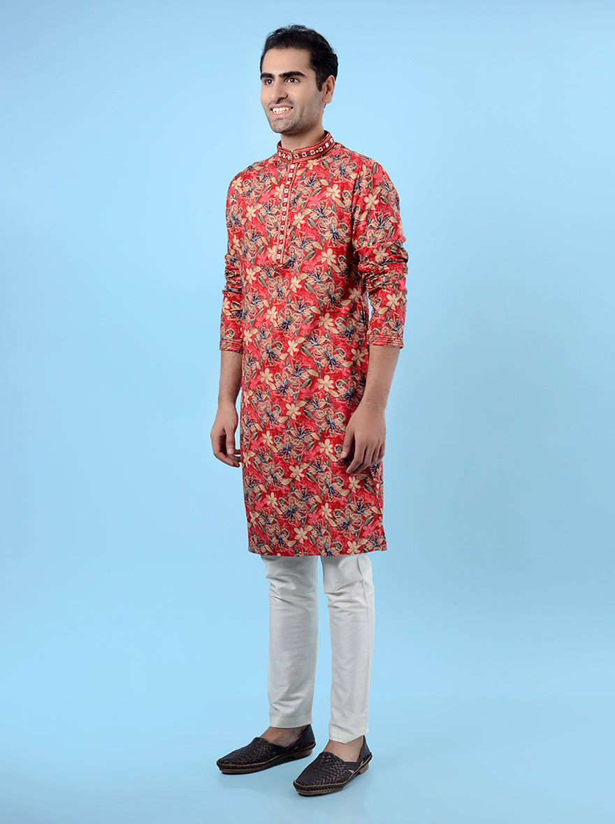 Red printed ethnic kurta pajama for men, designed with mirror embroidery for a traditional touch.