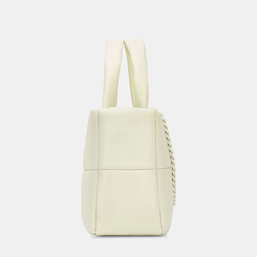 Stay organized and fashionable with the Lavie Luxe Puff Off White Tote, featuring multiple pockets for convenience on the go.