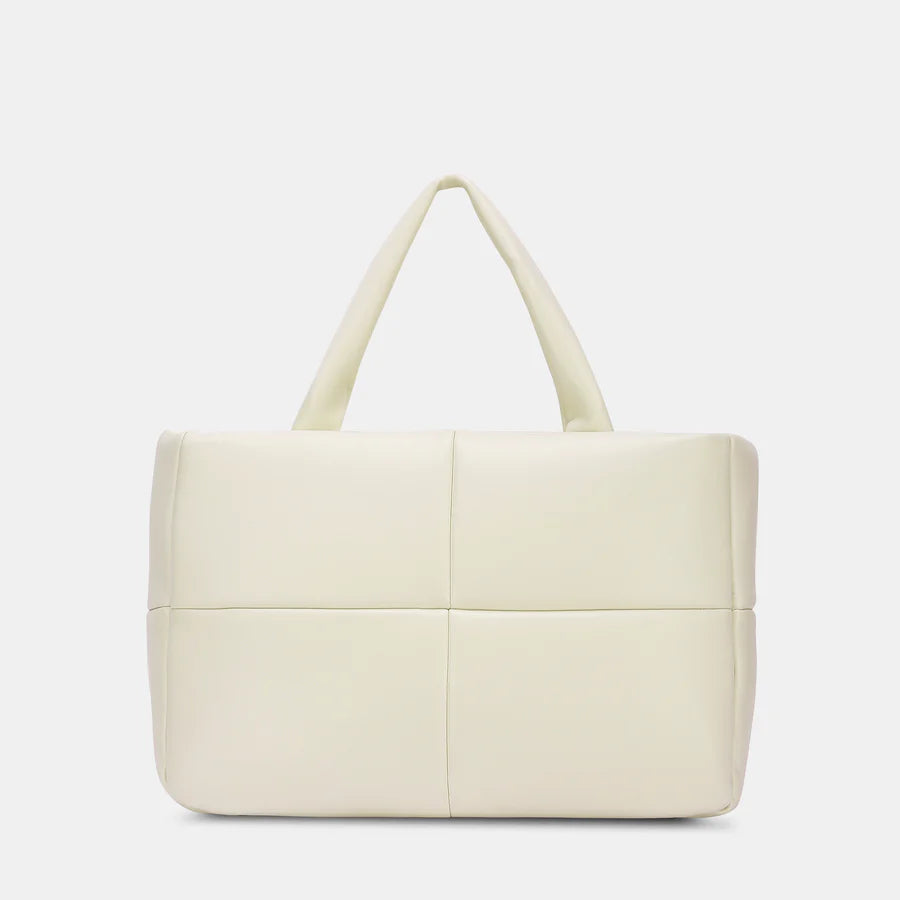 Crafted from high-quality materials, the Lavie Luxe Puff Off White Small Tote is stylish and durable for everyday use.