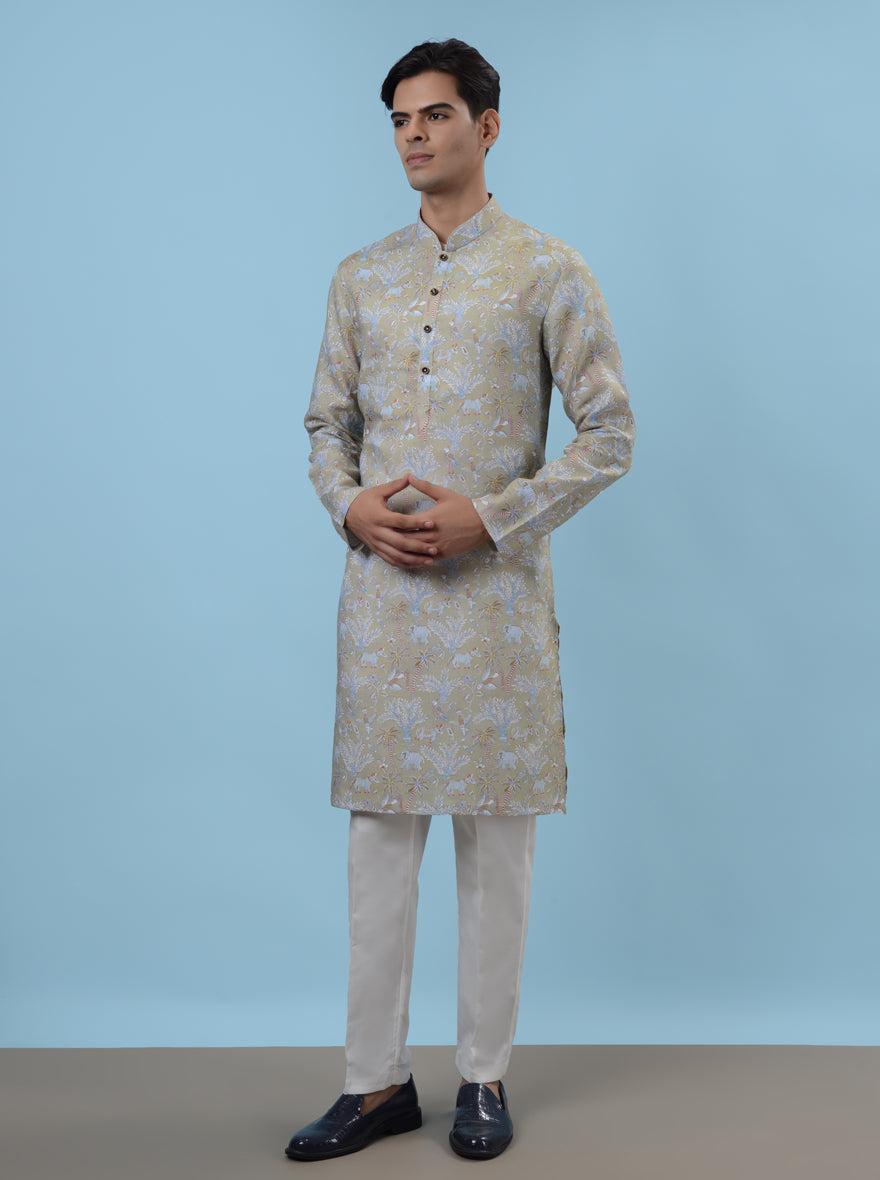 Elevate your ethnic wear collection with our stylish green kurta pajama, ideal for gatherings.