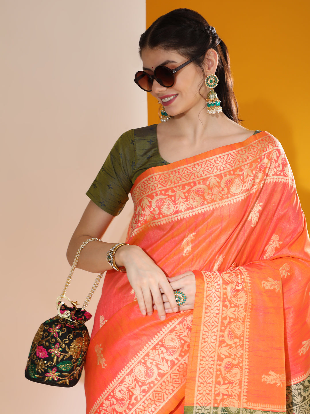 Soft raw silk saree with intricate two-tone weaving and contrast pallu design