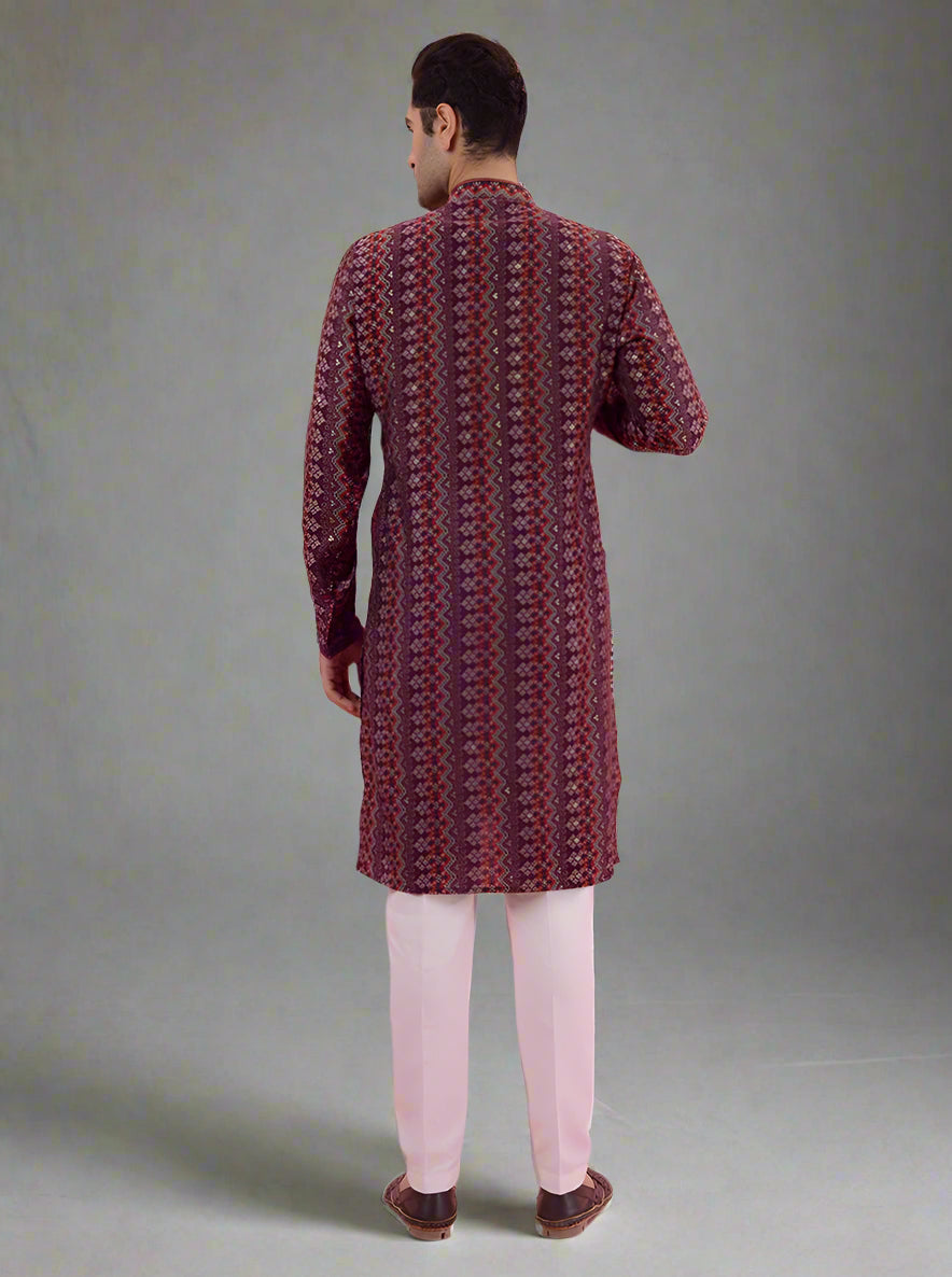 Traditional maroon kurta pajama for men, crafted from silk blend fabric for elegant wear.