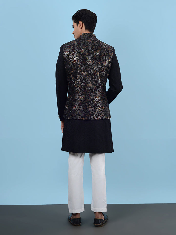 Make a grand entrance at your sangeet in this stunning Indowestern, crafted from high-quality silk blend fabric and detailed embroidery, perfect for festive celebrations in the USA.