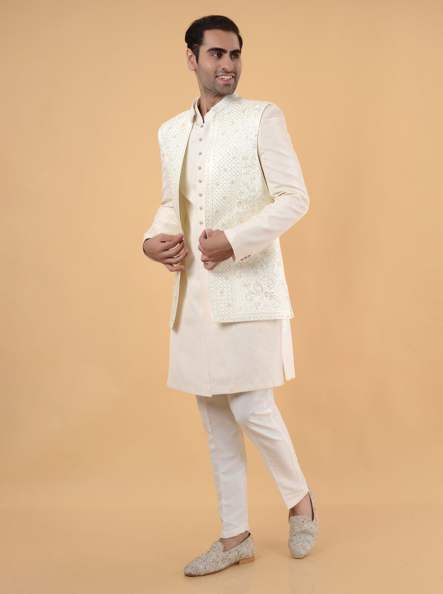 Make a lasting impression at engagements with this stunning cream Indo Western outfit, tailored for style.