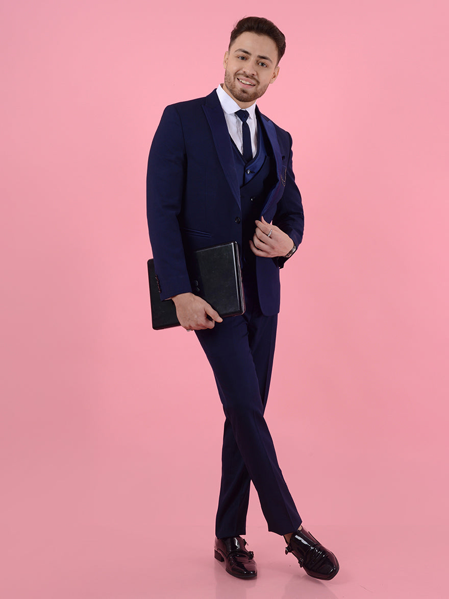 Classic 1-button blue suit featuring self-textured fabric, designed for a sophisticated look at formal gatherings.