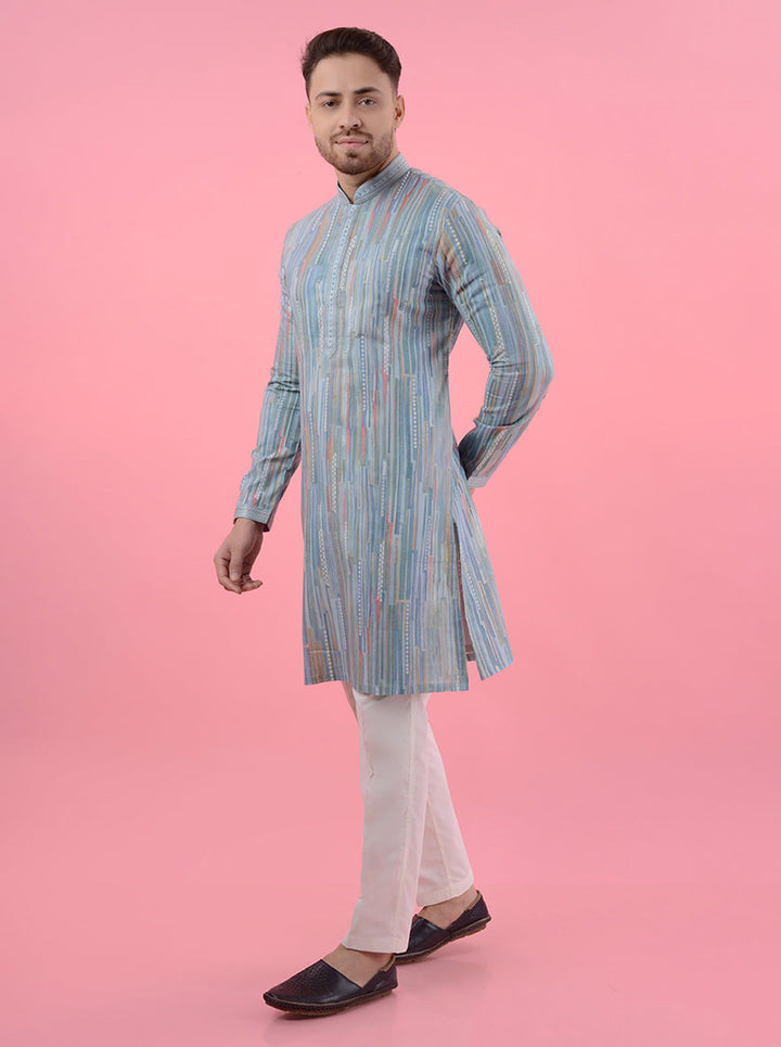 Men's traditional sky blue kurta pajama with multi-printed design, perfect for celebrations.