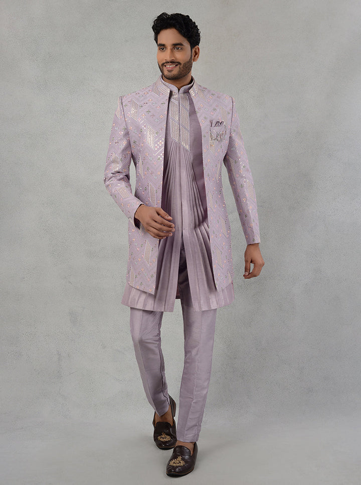 Shine brightly at every gathering with this elegant Lilac Indowestern, designed for modern celebrations.