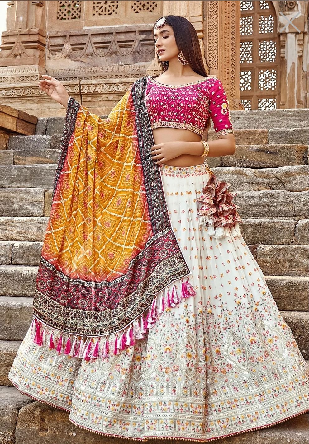 Eye-catching multi-color bridal lehenga and choli set, ideal for making a bold statement on your special wedding day.