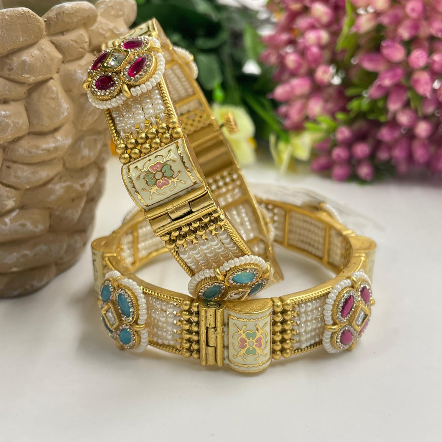 Classic golden bangles that never go out of style.